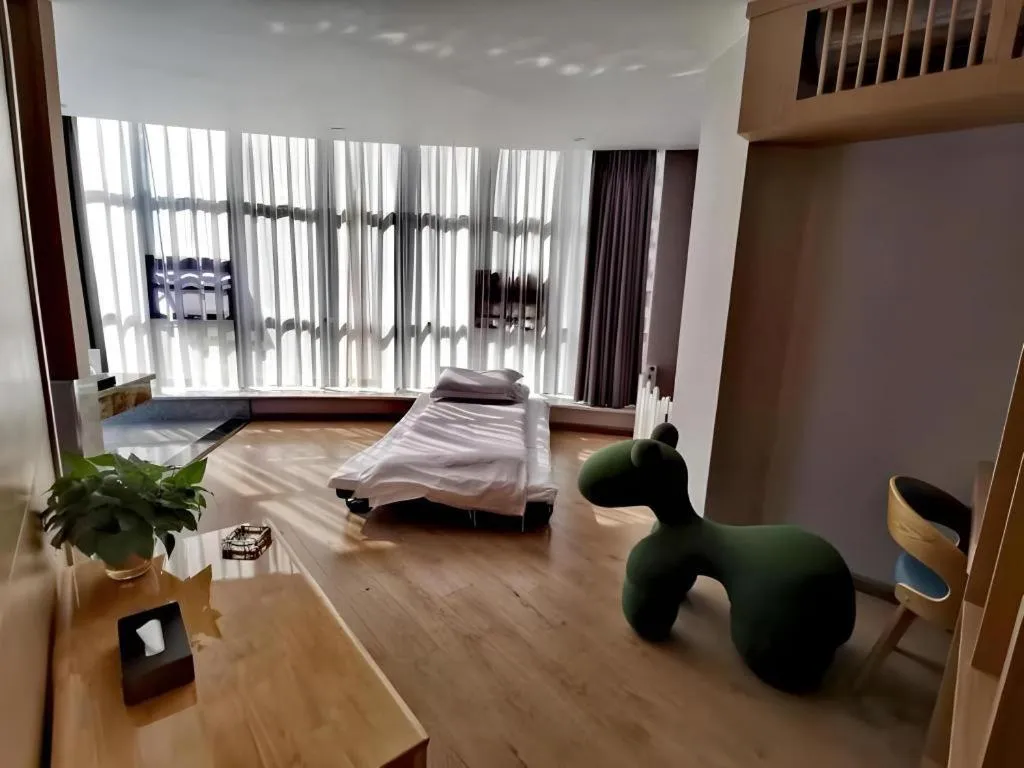 Bed in VX Dali Erhai Park Seascape Hotel