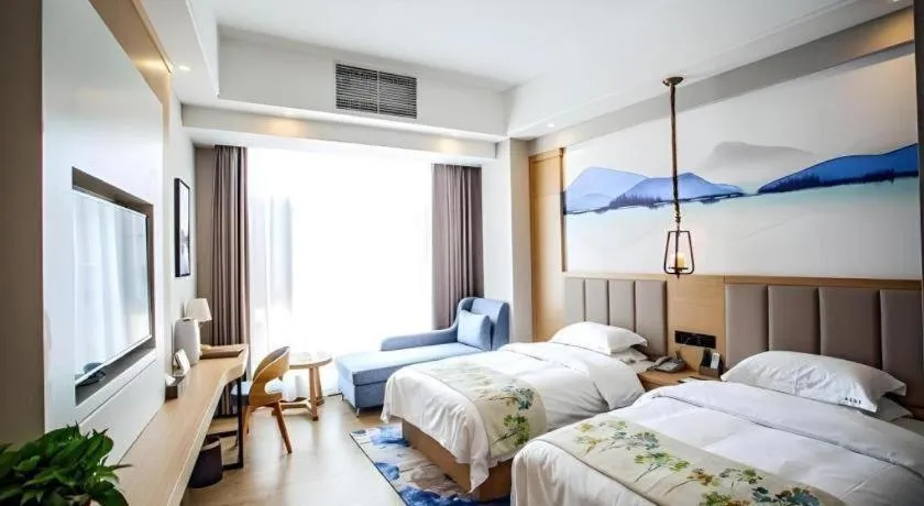 Bed in VX Dali Erhai Park Seascape Hotel