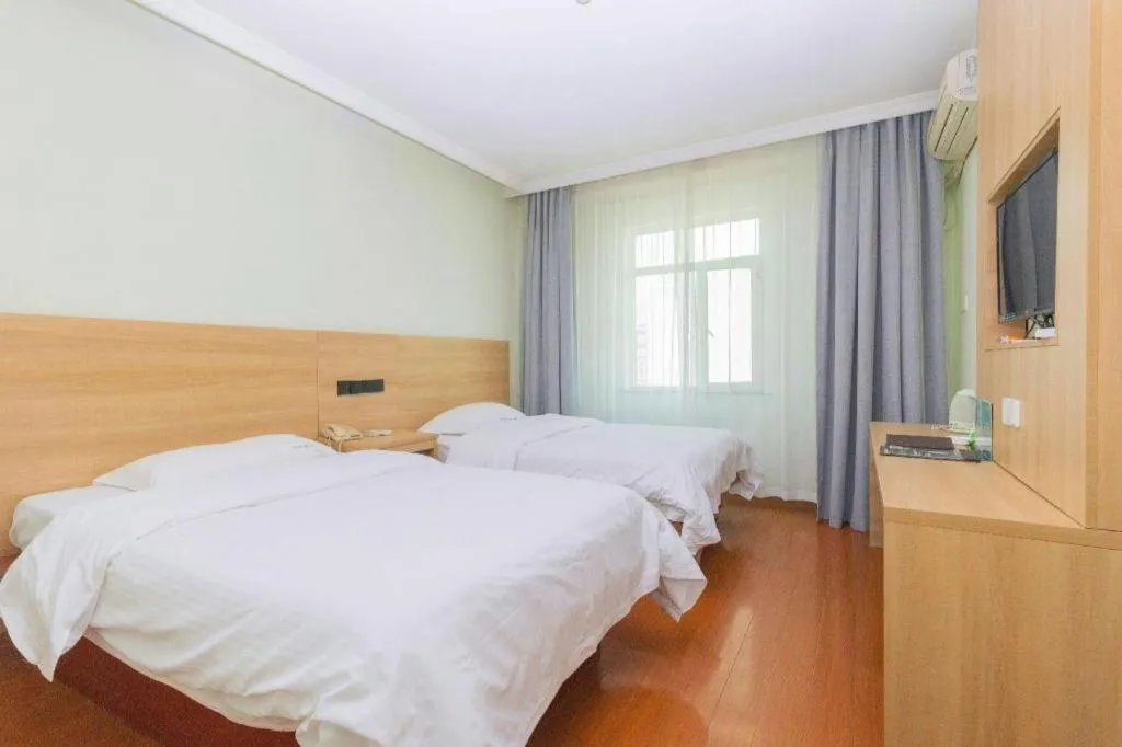 Bed in GreenTree Inn Chongqing Longhu Times Tianjie Xietaizi Metro Station