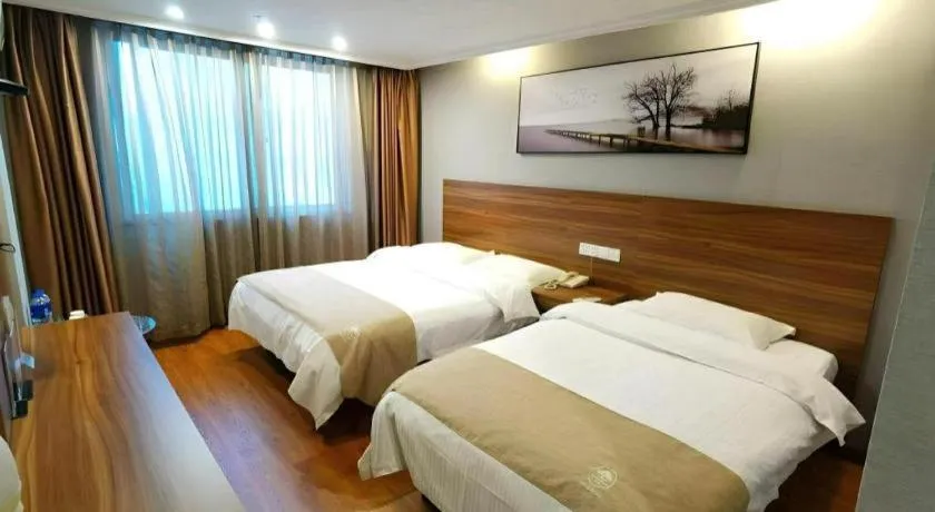 Bed in GreenTree Inn Chongqing Longhu Times Tianjie Xietaizi Metro Station