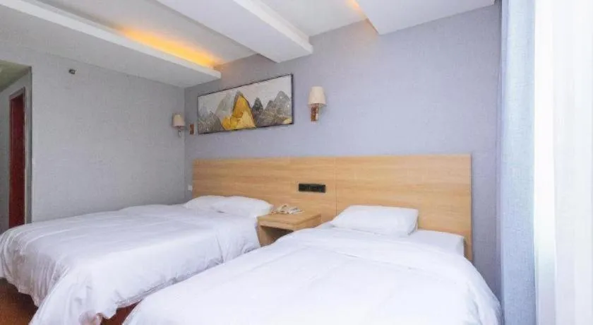 Bed in GreenTree Inn Chongqing Longhu Times Tianjie Xietaizi Metro Station