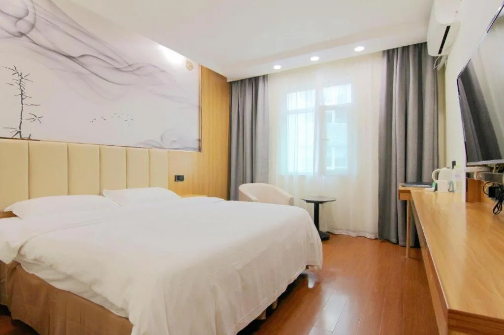 Bed in GreenTree Inn Chongqing Longhu Times Tianjie Xietaizi Metro Station