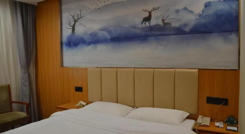 Bed in GreenTree Inn Chongqing Longhu Times Tianjie Xietaizi Metro Station