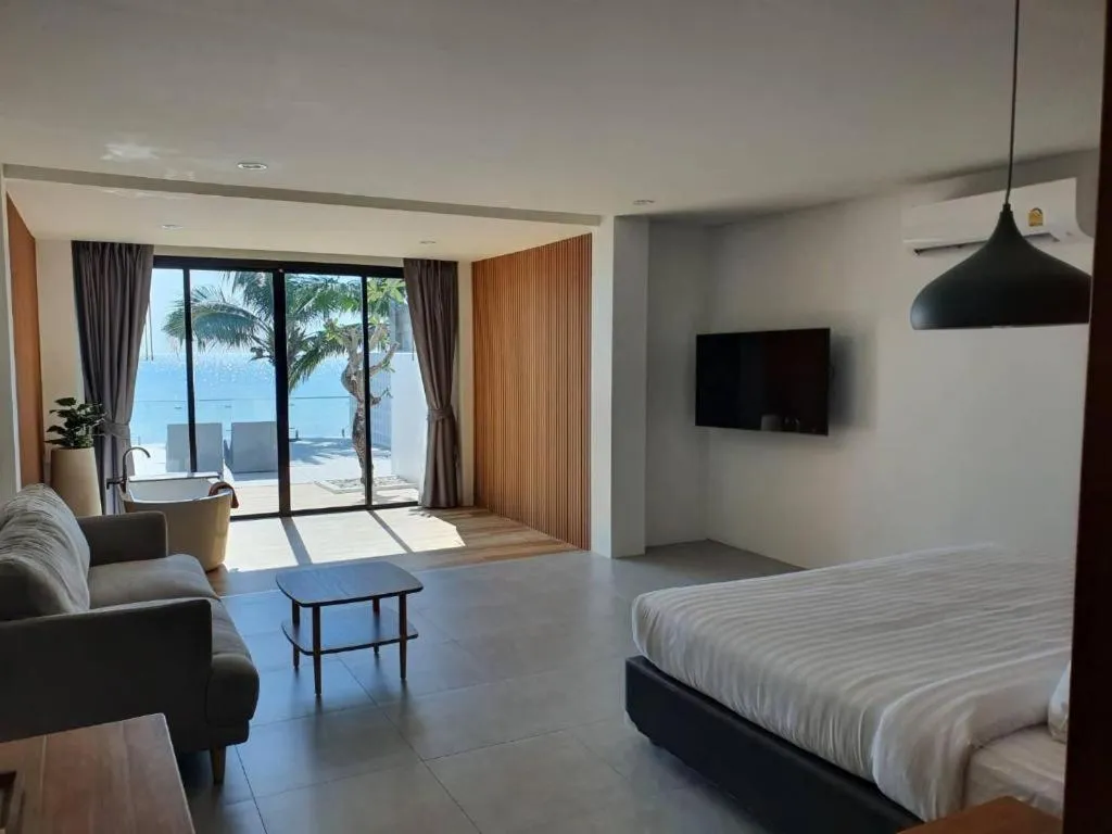 Bed in Rattana Pura Beach Resort