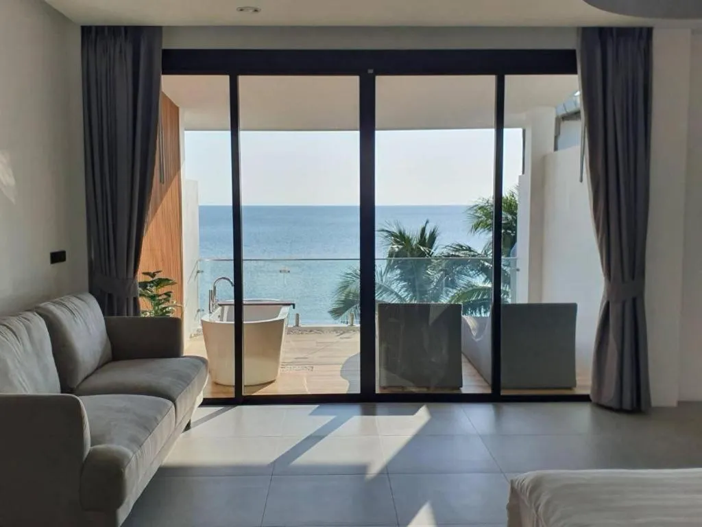 Bed in Rattana Pura Beach Resort