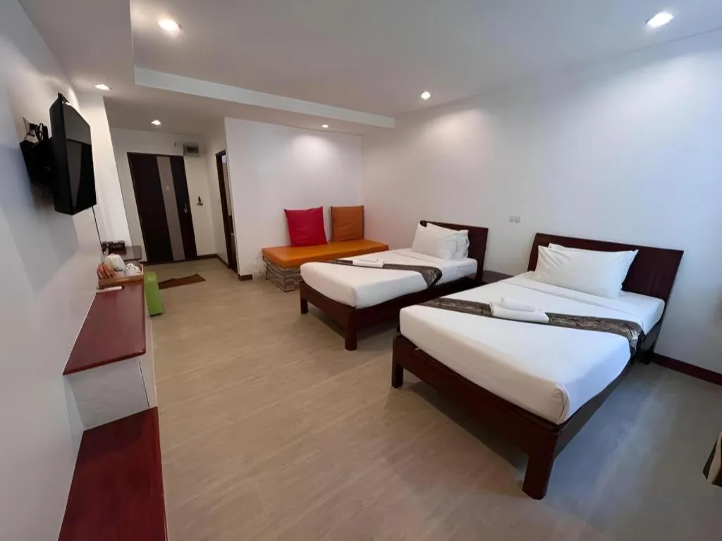 Bed in Rattana Pura Beach Resort