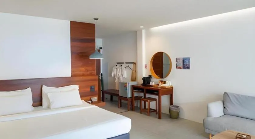 Bed in Rattana Pura Beach Resort