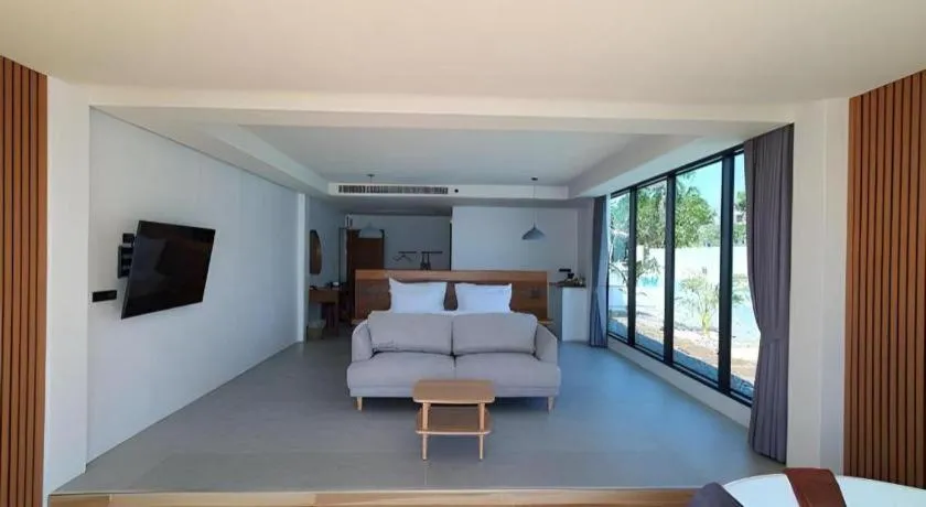 Bed in Rattana Pura Beach Resort