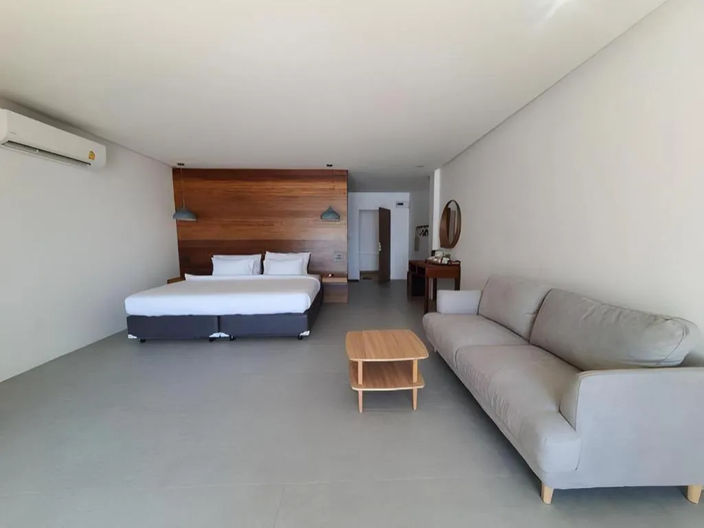 Bed in Rattana Pura Beach Resort