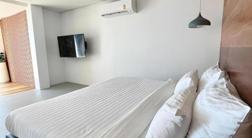 Bed in Rattana Pura Beach Resort