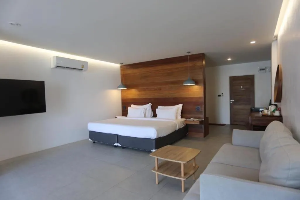 Bed in Rattana Pura Beach Resort