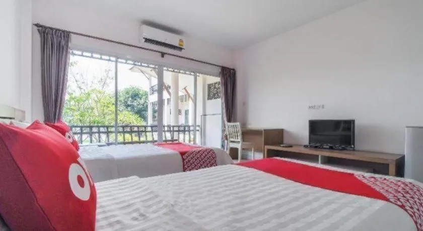 Bed in Super OYO 662 Malee Bunga Hotel