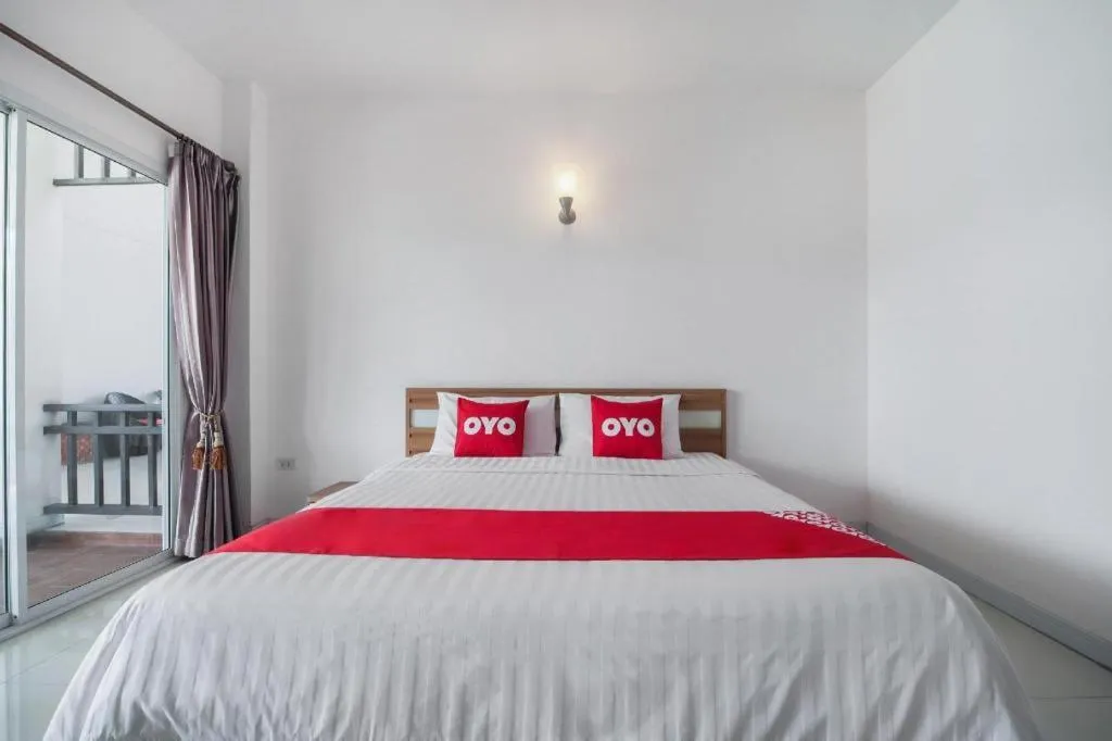 Bed in Super OYO 662 Malee Bunga Hotel