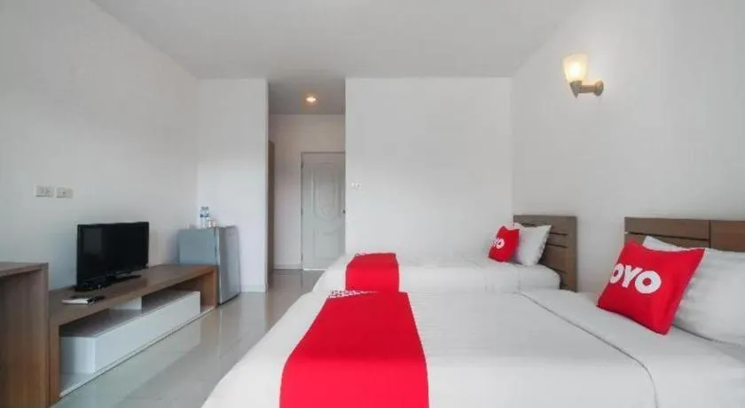 Bed in Super OYO 662 Malee Bunga Hotel