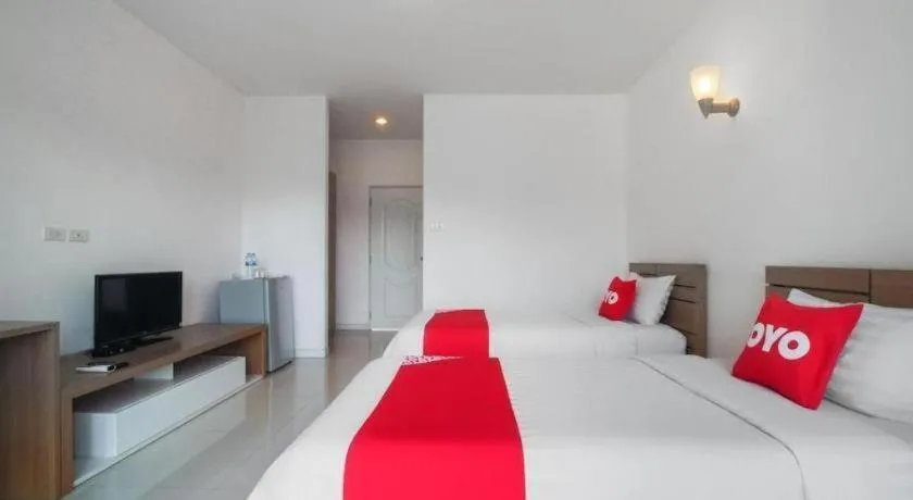 Bed in Super OYO 662 Malee Bunga Hotel