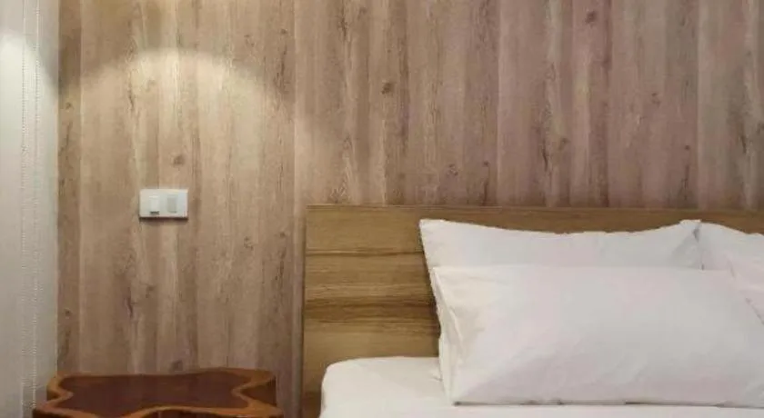 Bed in THE S VILLAS HOTEL