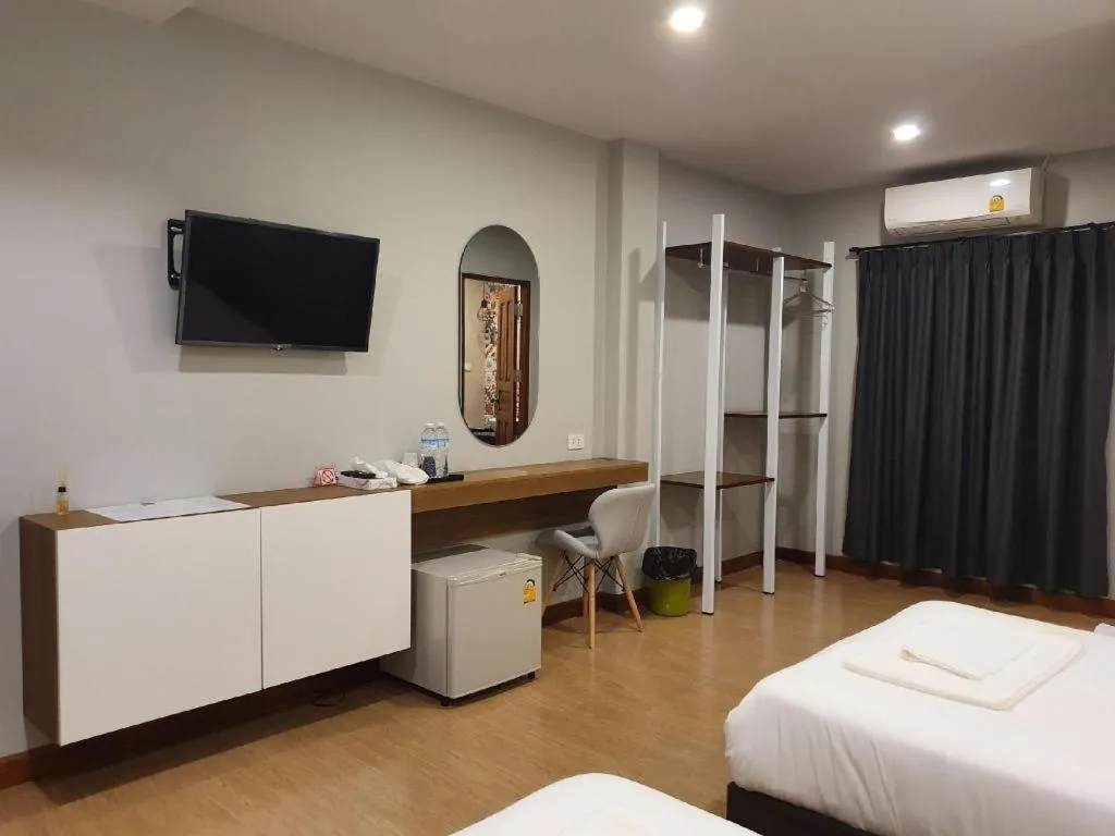 Bed in THE S VILLAS HOTEL