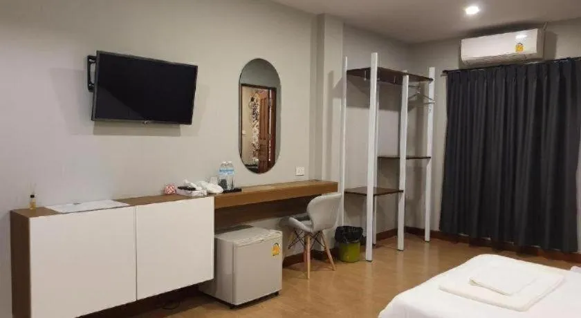 Bed in THE S VILLAS HOTEL