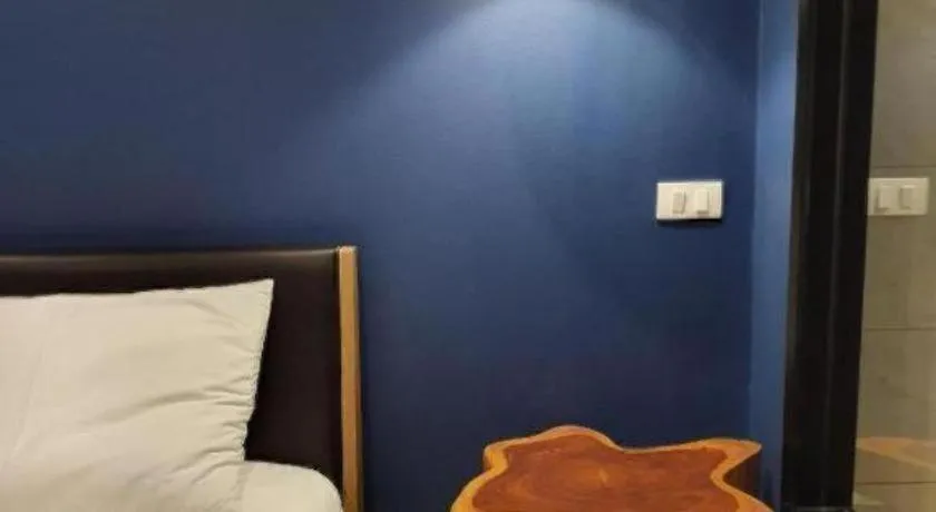 Bed in THE S VILLAS HOTEL