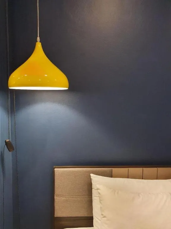 Bed in THE S VILLAS HOTEL