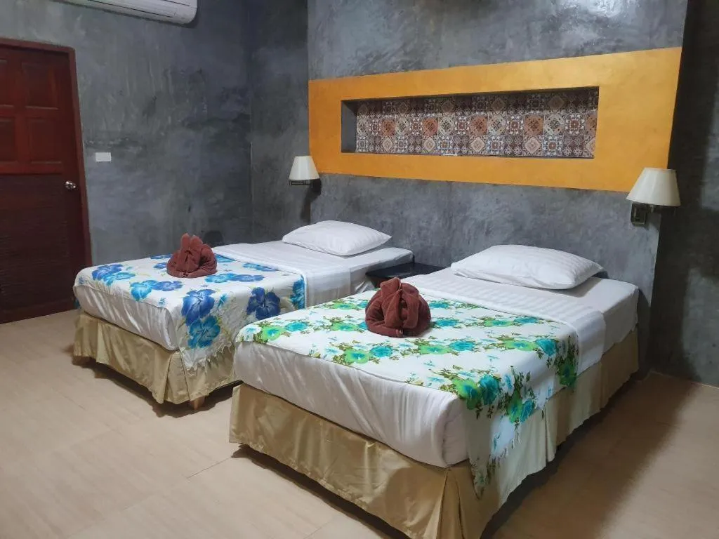 Bed in Saikaew Boutique Hotel