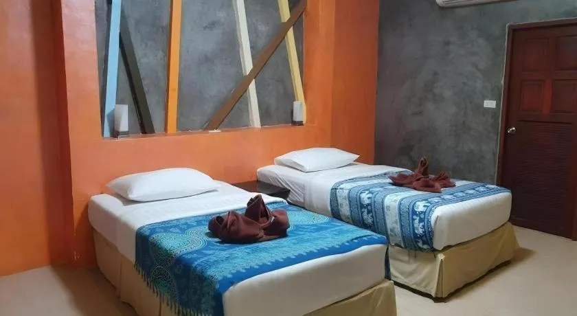 Bed in Saikaew Boutique Hotel