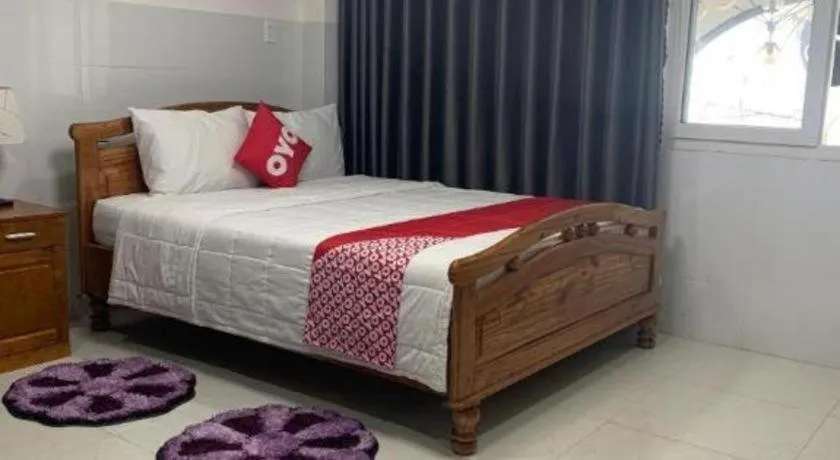 Bed in OYO 1028 Flower House Apartment