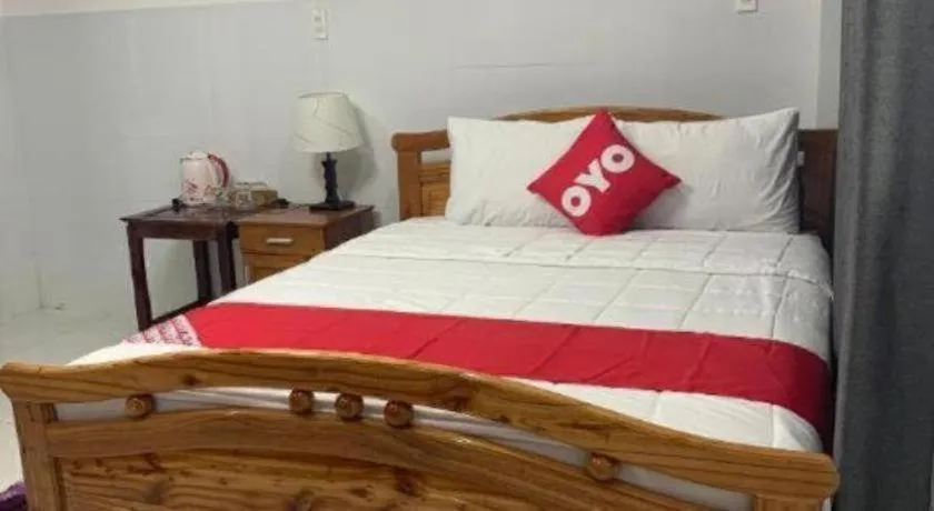Bed in OYO 1028 Flower House Apartment