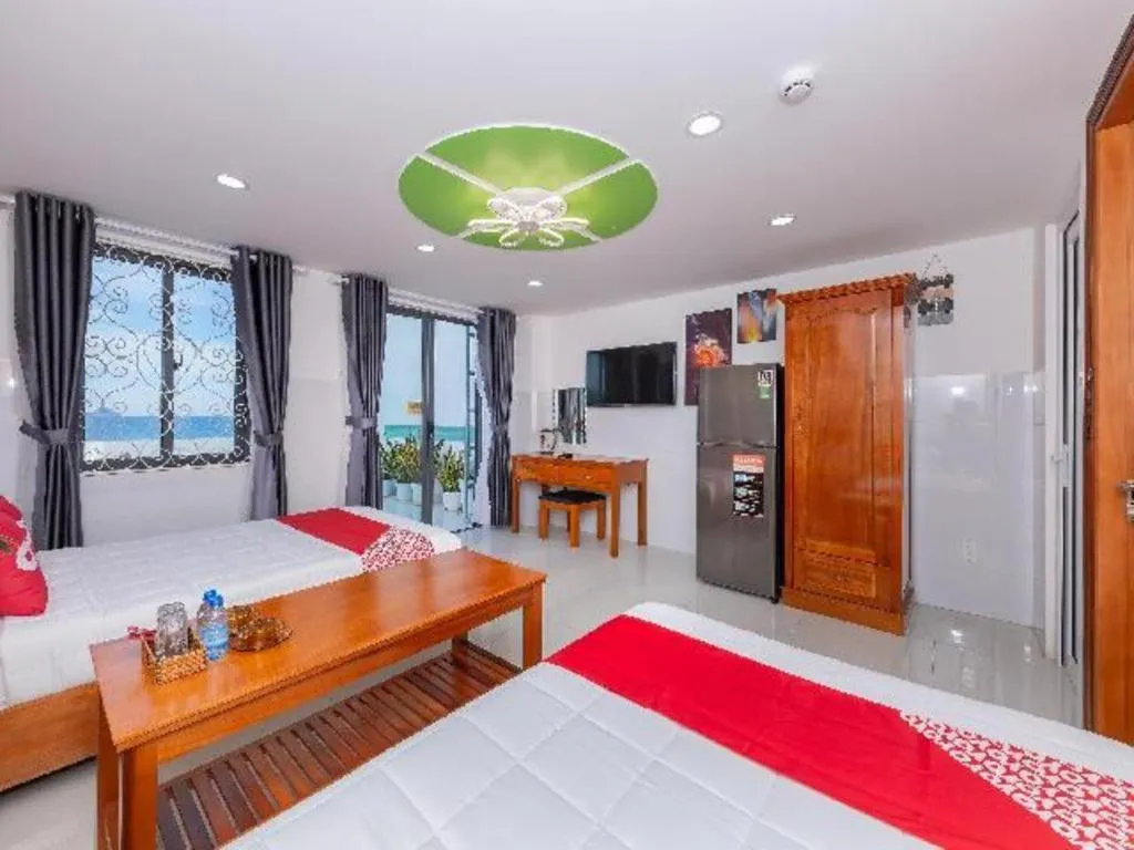 Bed in OYO 1028 Flower House Apartment