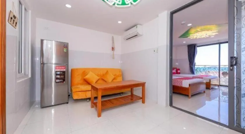 Bed in OYO 1028 Flower House Apartment