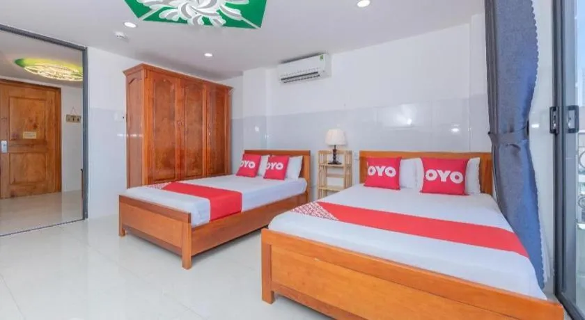 Bed in OYO 1028 Flower House Apartment