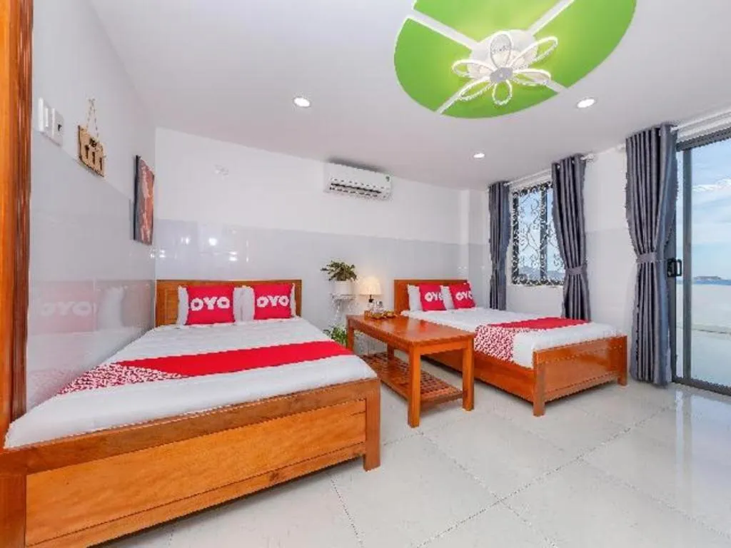 Bed in OYO 1028 Flower House Apartment