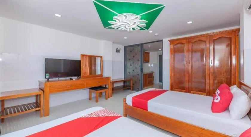 Bed in OYO 1028 Flower House Apartment