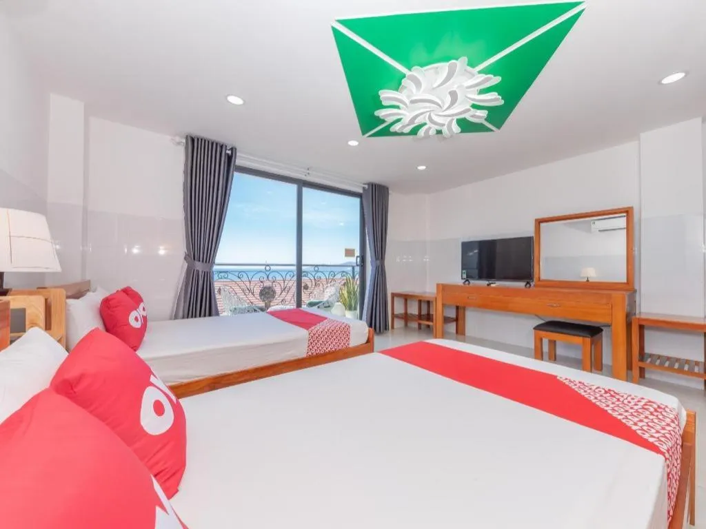 Bed in OYO 1028 Flower House Apartment