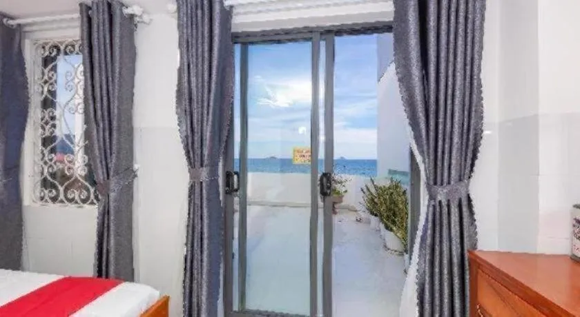 Bed in OYO 1028 Flower House Apartment