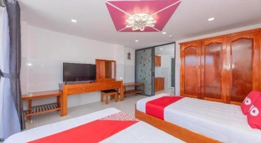 Bed in OYO 1028 Flower House Apartment