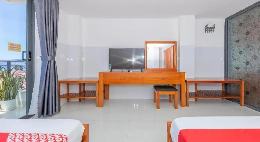 Bed in OYO 1028 Flower House Apartment