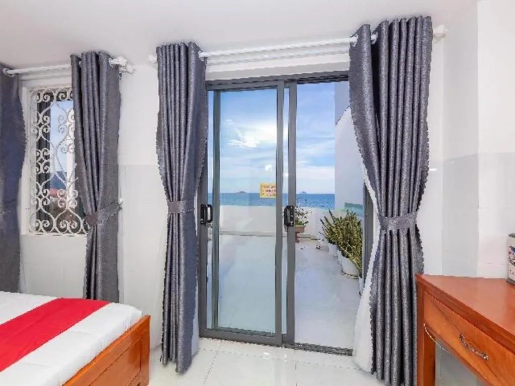 Bed in OYO 1028 Flower House Apartment