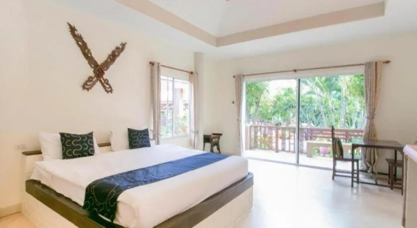 Bed in CAPITAL O961 Baan Dow Chompoo Resort