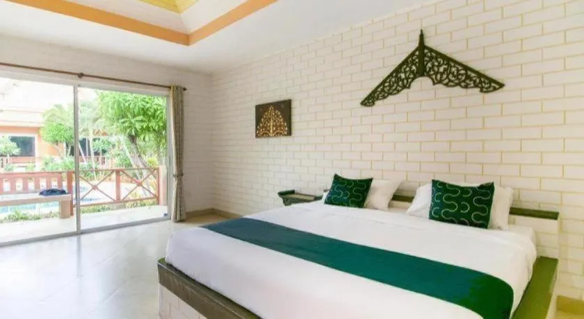 Bed in CAPITAL O961 Baan Dow Chompoo Resort