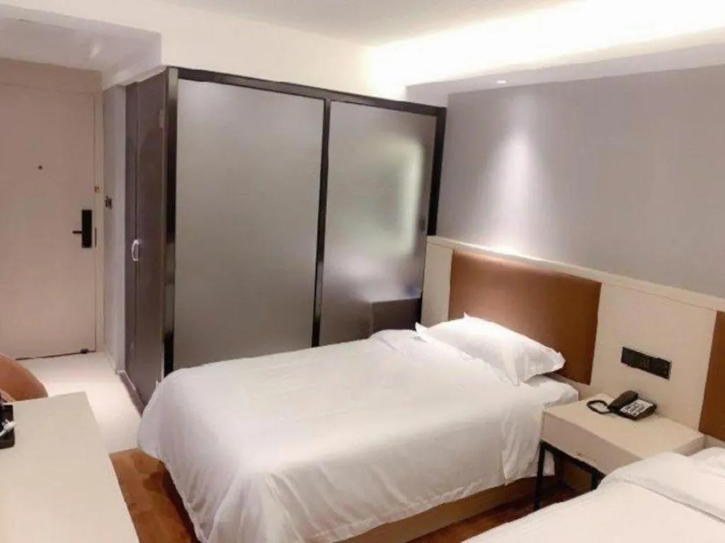 Bed in Gya Hotel Shanghai Long Distance Passenger Terminal Station