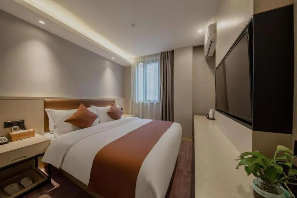 Bed in Gya Hotel Shanghai Long Distance Passenger Terminal Station