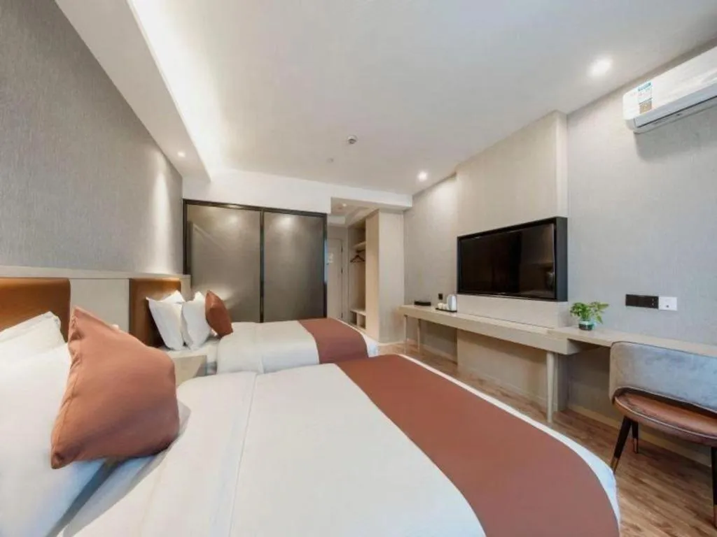 Bed in Gya Hotel Shanghai Long Distance Passenger Terminal Station