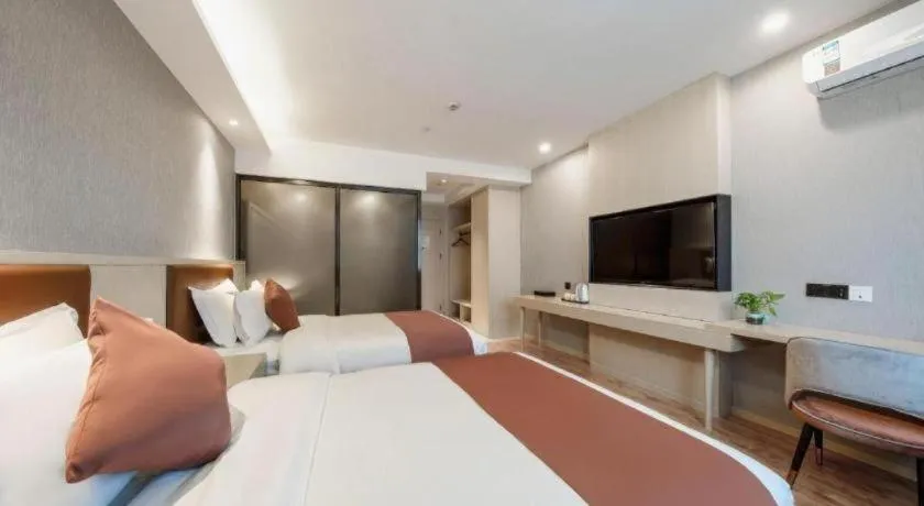 Bed in Gya Hotel Shanghai Long Distance Passenger Terminal Station