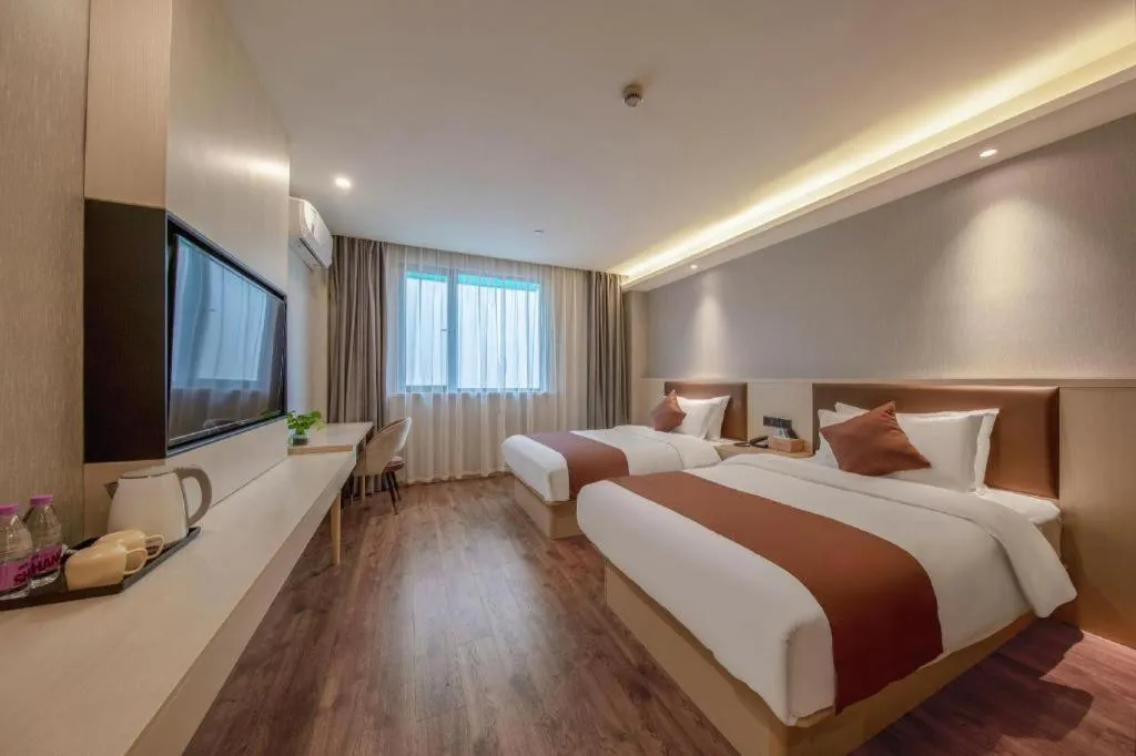 Bed in Gya Hotel Shanghai Long Distance Passenger Terminal Station