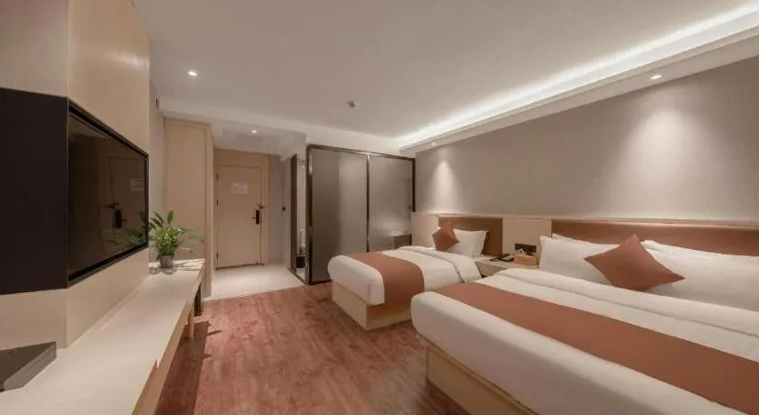 Bed in Gya Hotel Shanghai Long Distance Passenger Terminal Station