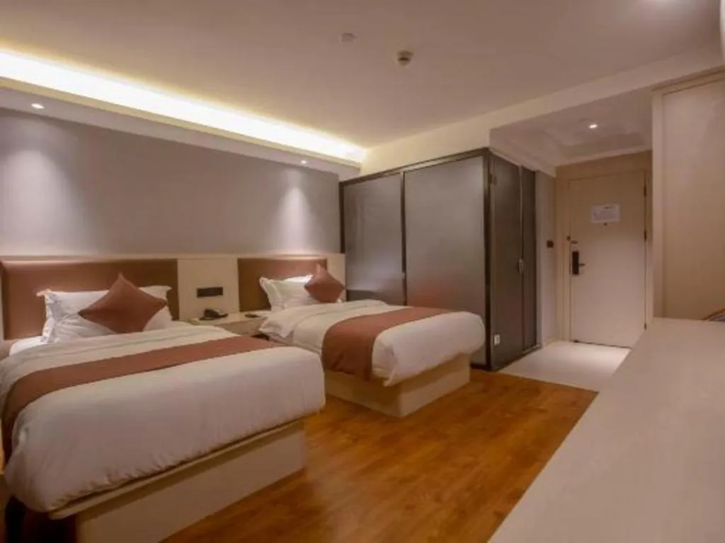 Bed in Gya Hotel Shanghai Long Distance Passenger Terminal Station