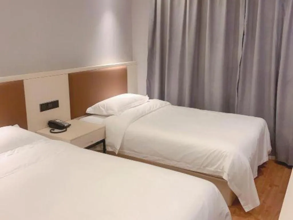 Bed in Gya Hotel Shanghai Long Distance Passenger Terminal Station