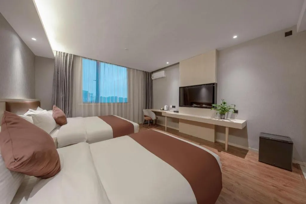 Bed in Gya Hotel Shanghai Long Distance Passenger Terminal Station