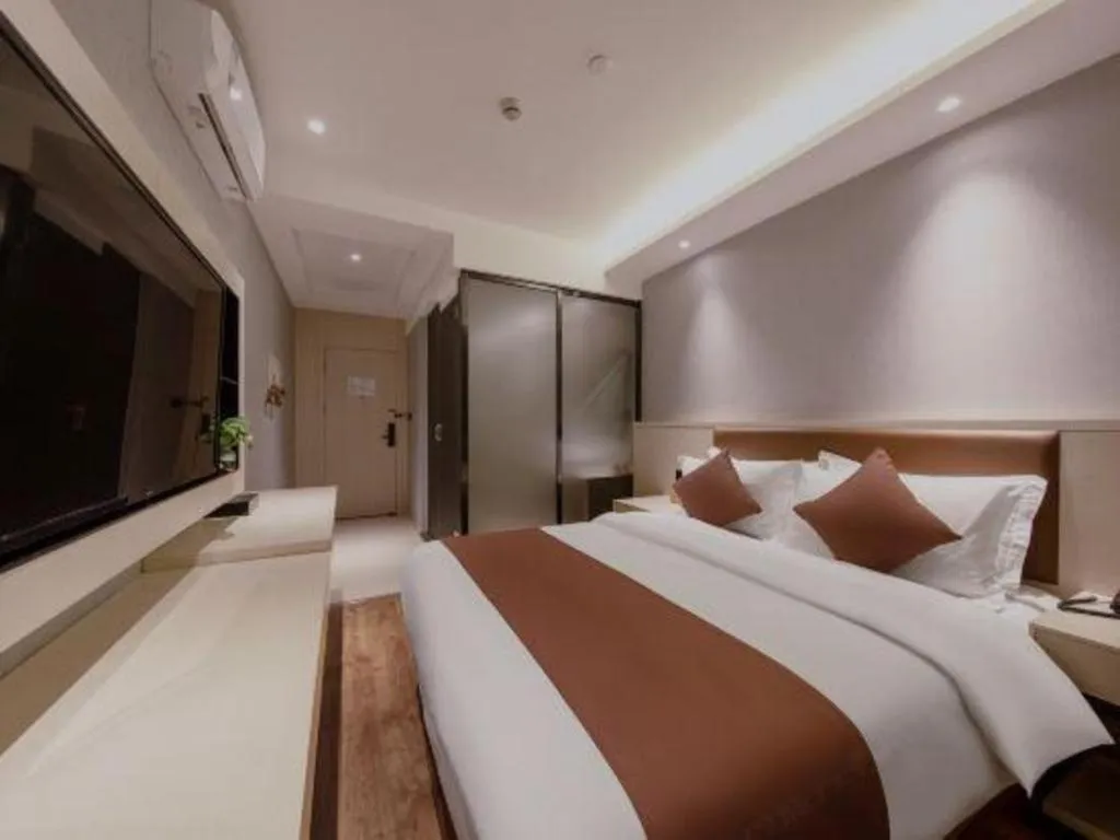 Bed in Gya Hotel Shanghai Long Distance Passenger Terminal Station